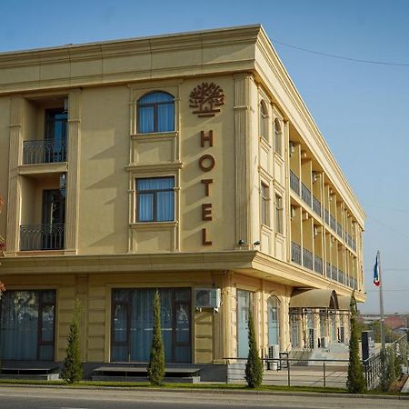 Almalyk Plaza Hotel Olmaliq Buitenkant foto