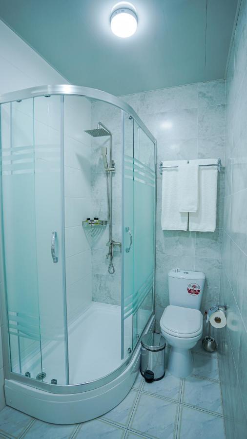 Almalyk Plaza Hotel Olmaliq Buitenkant foto