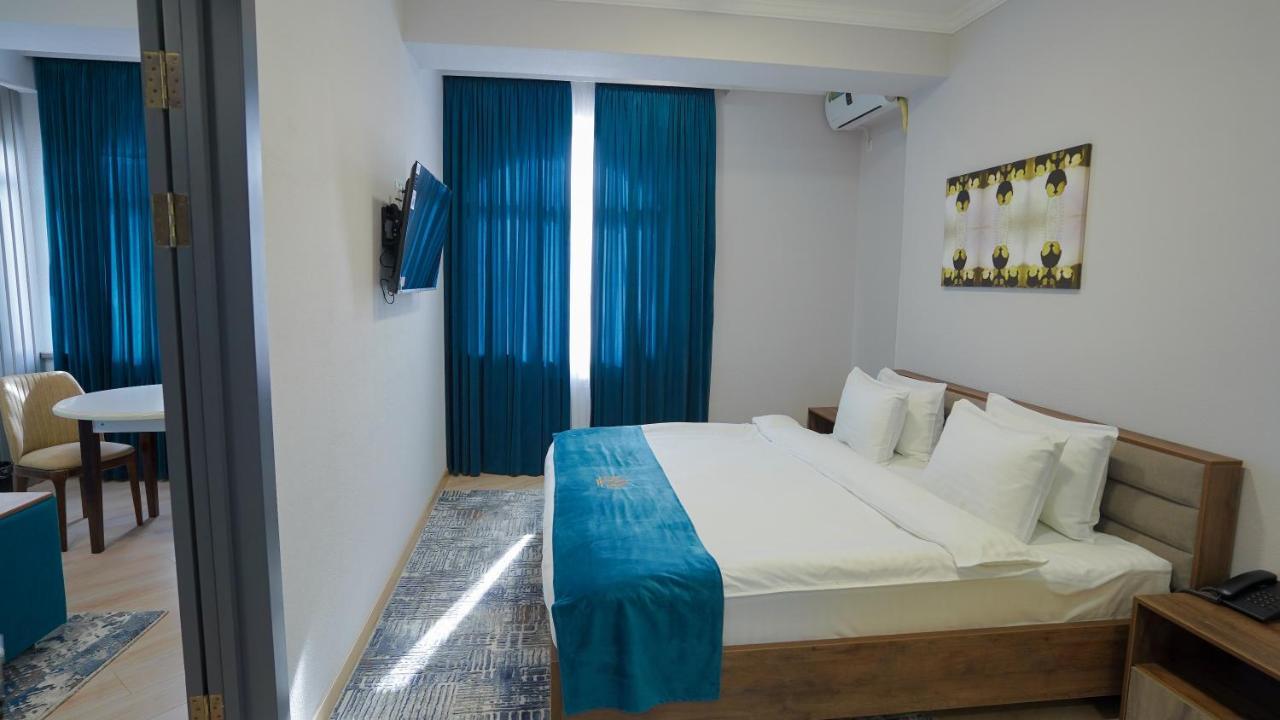 Almalyk Plaza Hotel Olmaliq Buitenkant foto
